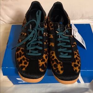 Adidas leopard and emerald green laces